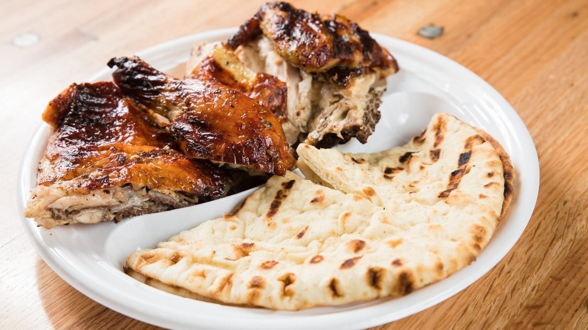 Charcoal Broiled 1/2 White Meat Chicken.